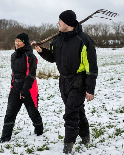 Black Fluorescent Yellow Coloured Elka Mens Working Xtreme Winter Thermal Coverall With Recycled Padding on snow background 