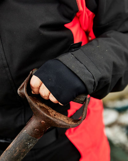 Black Red Coloured Elka Womens Working Xtreme Winter Thermal Coverall With Recycled Padding on blurry background 