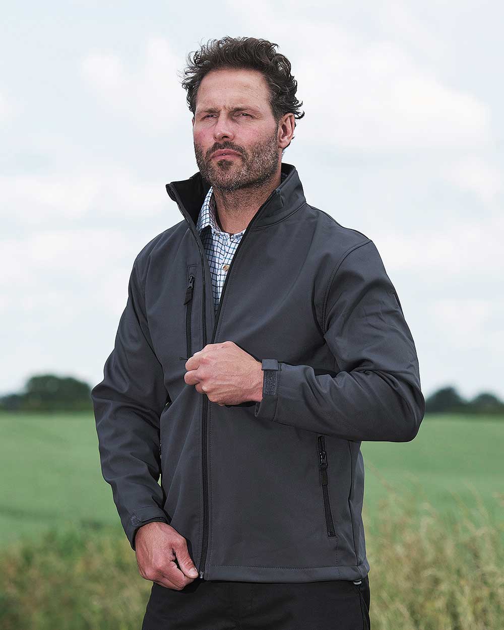 Black coloured Fort Selkirk Softshell Waterproof Jacket on blurry background 