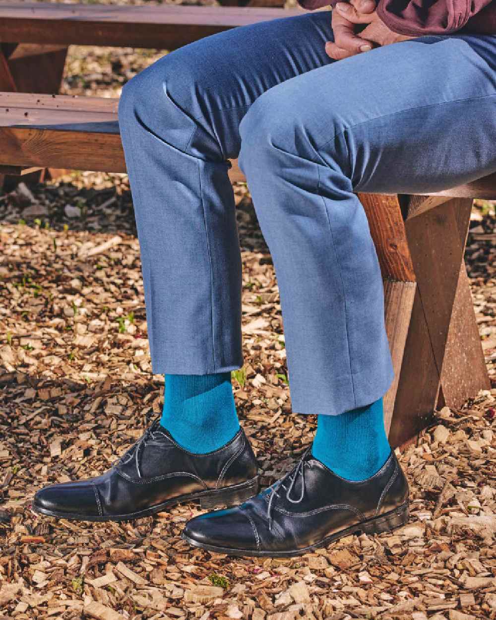 Teal coloured HJ Hall Classic Cotton Fashion Socks on ground background 