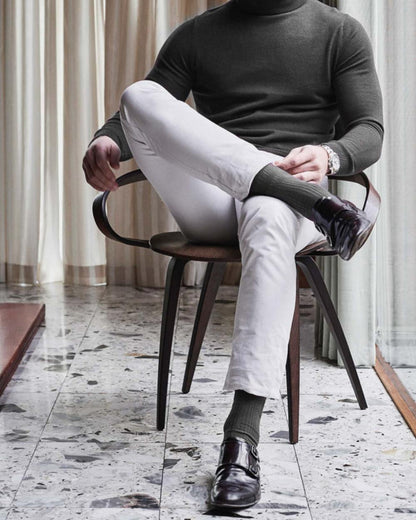 Charcoal coloured HJ Hall Original Cotton Soft Top Socks on indoor background 