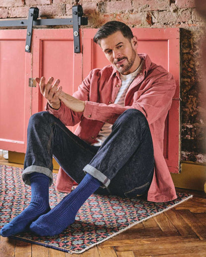 Royal Blue coloured HJ Hall Mens Original Bamboo Softop Socks on house background 