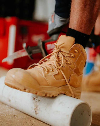 Wheat coloured Hard Yakka Legend S3 Safety Boots on outdoor background 
