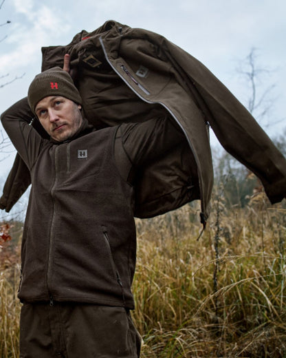 Shadow Brown Coloured Harkila Aspire Fleece Waistcoat on outdoor background 
