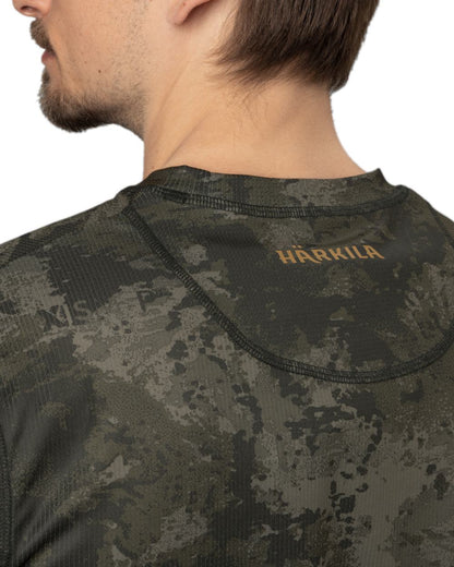 Axis Black Coloured Harkila NOCTYX Camo Long Sleeve T-Shirt on white background 