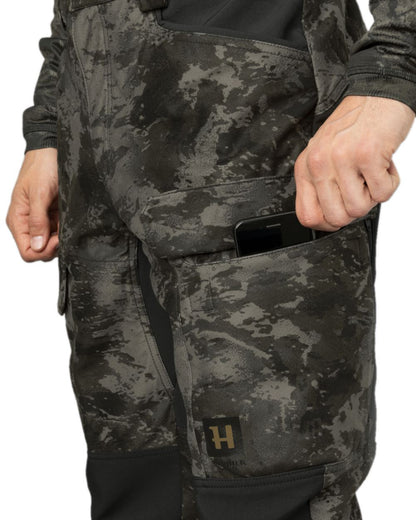 AXIS Black Black Coloured Harkila NOCTYX Camo Silent Trousers on white background 
