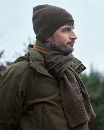 Shadow Brown Rustique Clay Coloured Harkila Reversible Beanie on outdoor background 