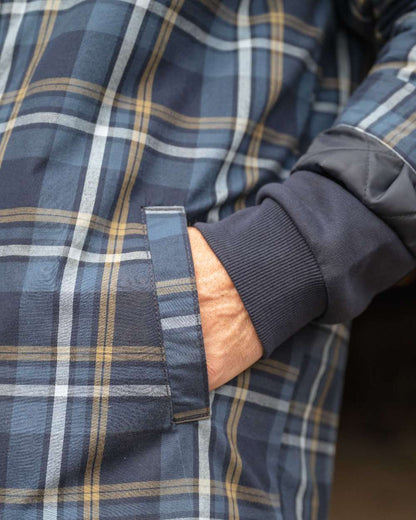 Navy Gold Coloured Hoggs of Fife Brunton Fleece Shacket on indoor background 