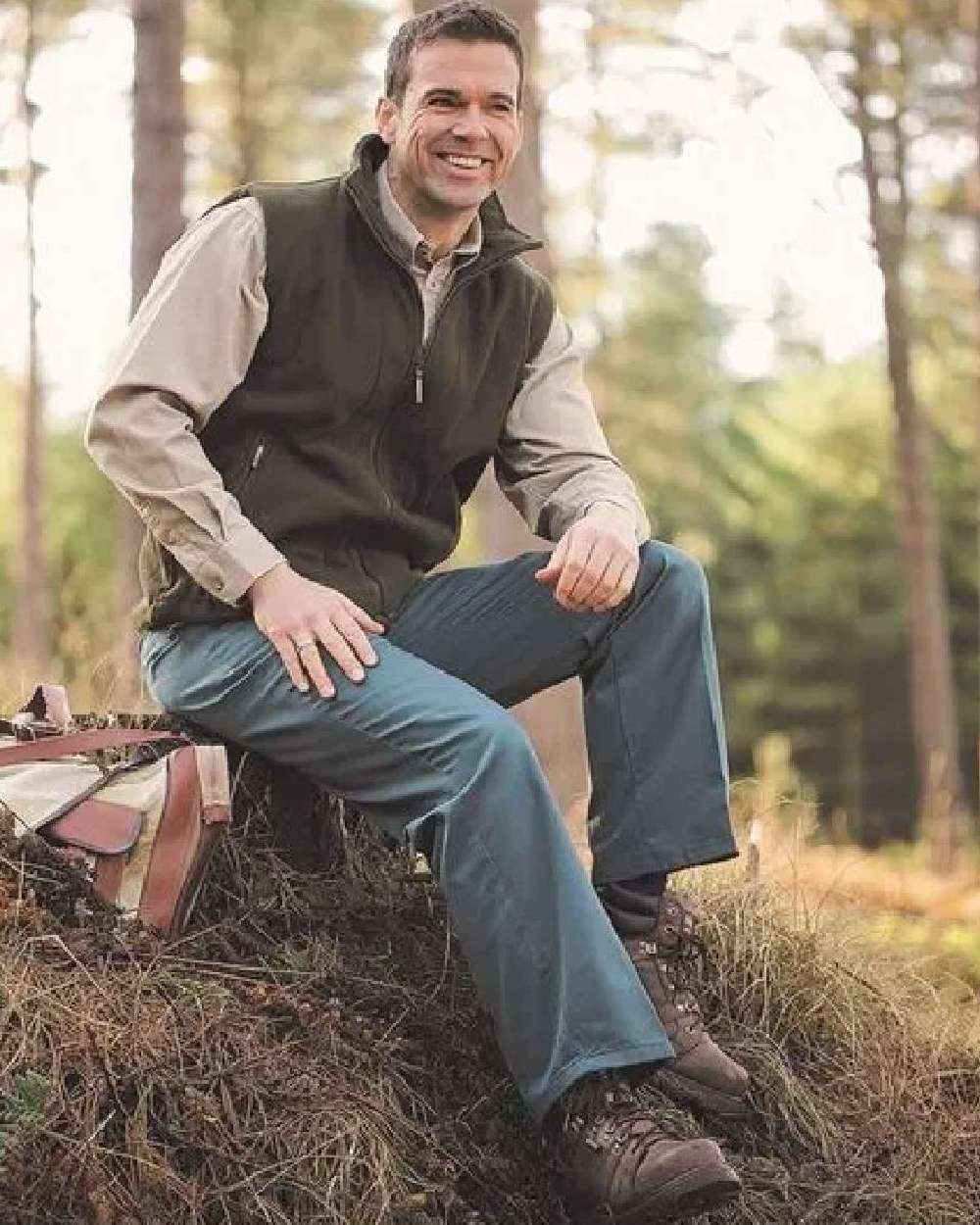 Spruce Coloured Hoggs of Fife Bushwhacker Thermal Stretch Trousers on forest background 