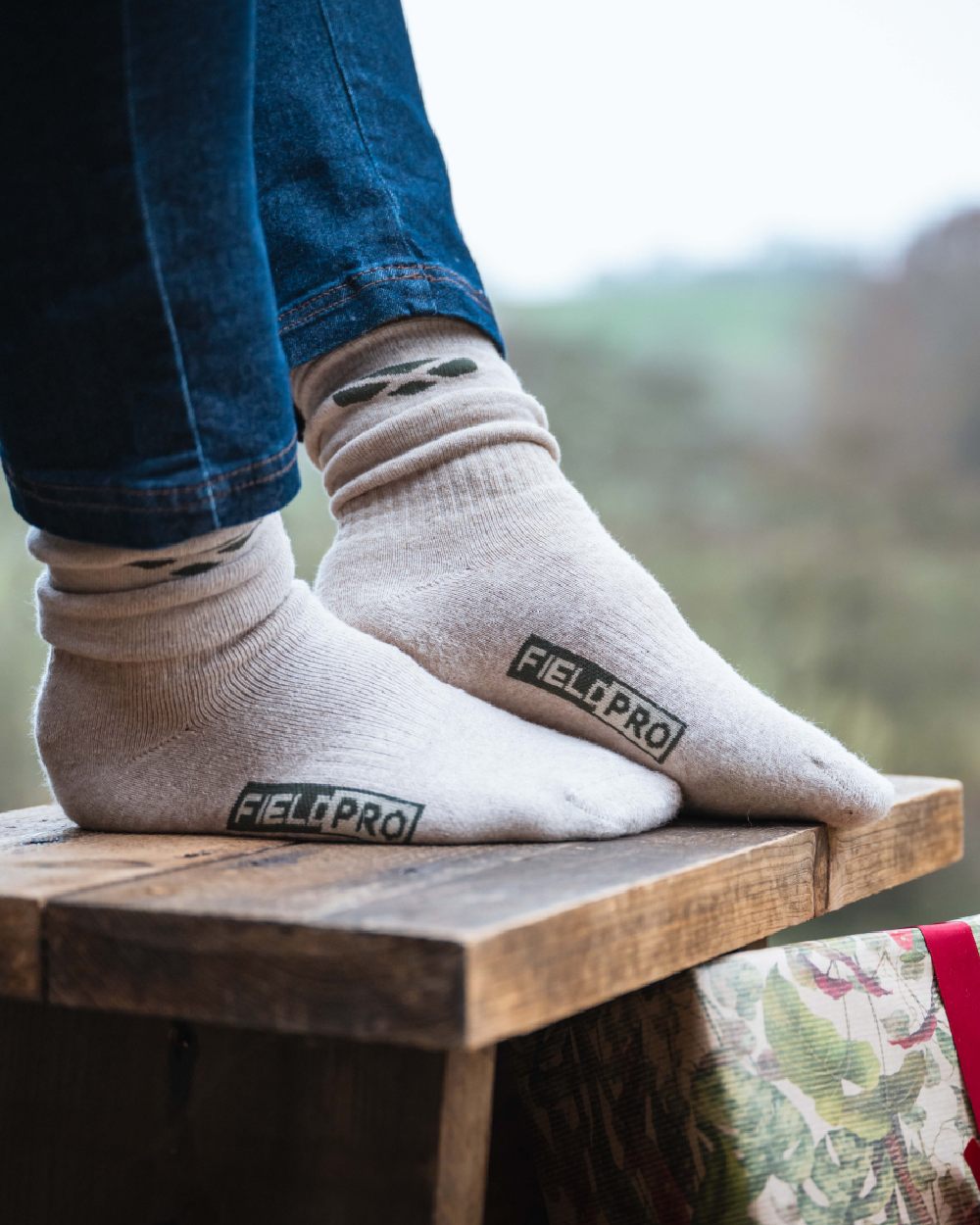 Hoggs of Fife Field Pro Country Socks Triple Pack On Outdoor Background