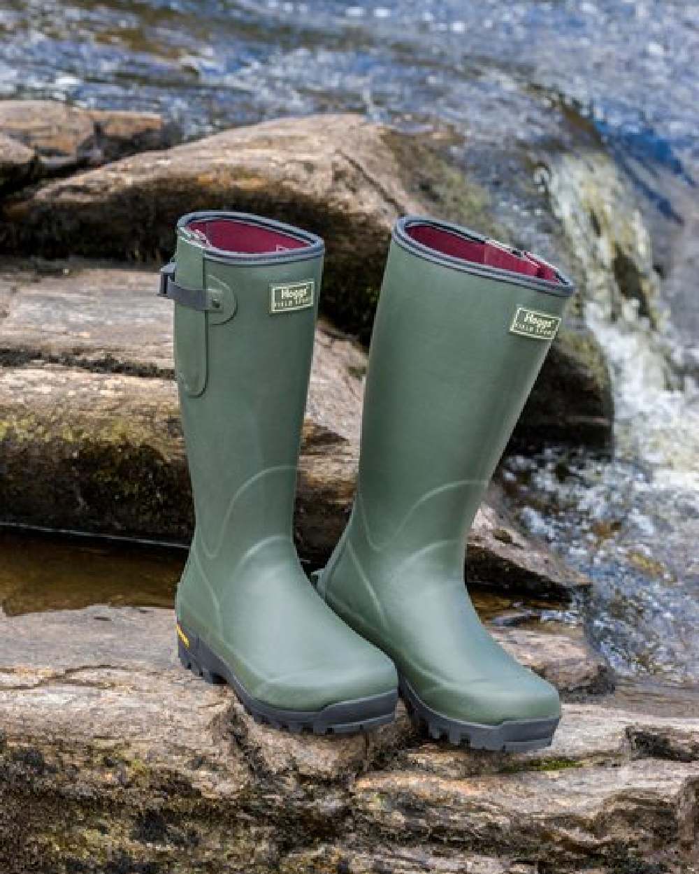 Field Green Coloured Hoggs of Fife Field Sport Neoprene Lined Wellingtons on waterfall background