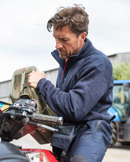 Navy Coloured Hoggs of Fife Green King II Quarter Zip Knit Fleece on outdoor background 