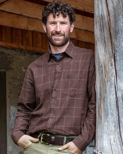 Rust Coloured Hoggs of Fife Harris Cotton Twill Check Shirt on wall background 