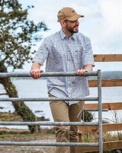 Green Red Coloured Hoggs of Fife Kessock Tattersall Short Sleeved Shirt on coastal background 