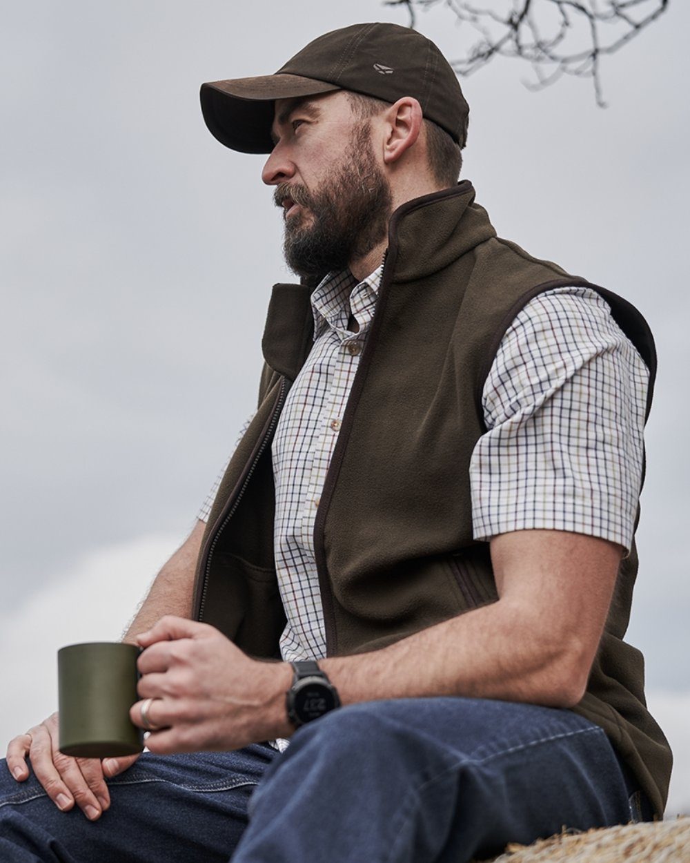 Green Red Coloured Hoggs of Fife Kessock Tattersall Short Sleeved Shirt on sky background 