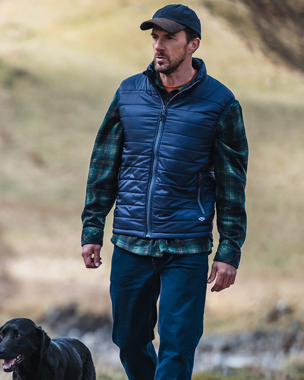Navy Merlot coloured Hoggs of Fife Kingston Rip-Stop Gilet on mountain background 