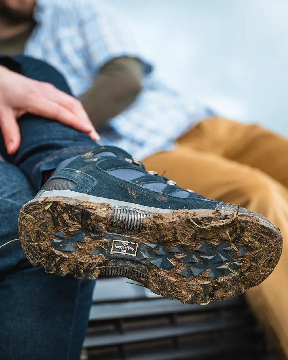 Navy Coloured Hoggs of Fife Nevis Waterproof Hiking Boots on blurry background 