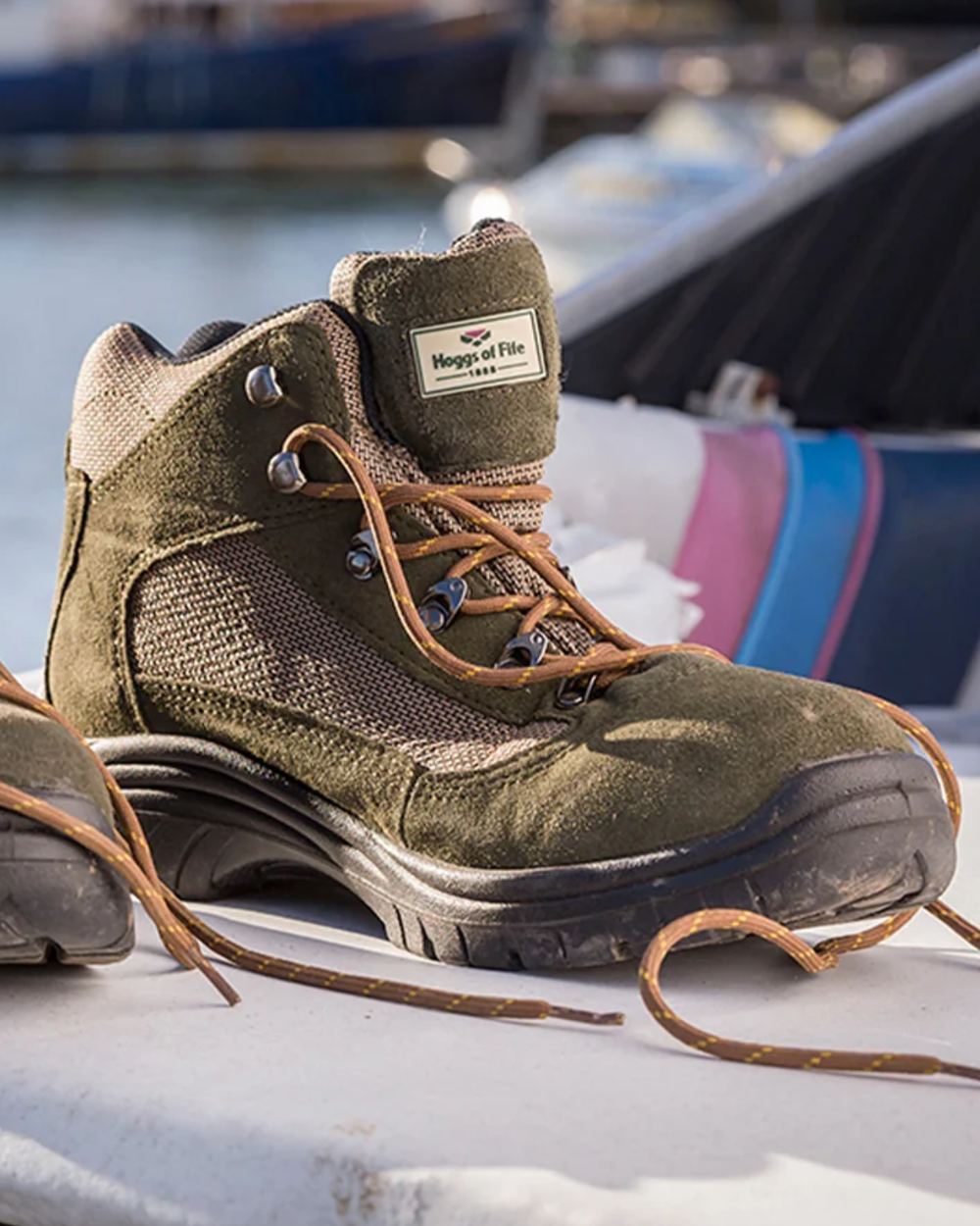 Fern Green Coloured Hoggs of Fife Rambler Waterproof Hiking Boots on boat background 