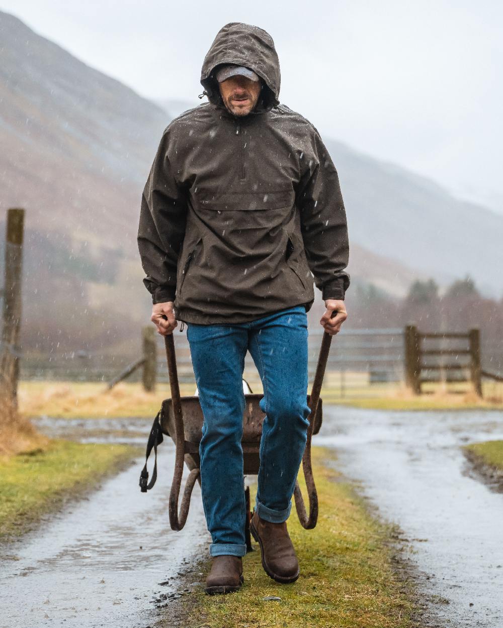 Crazy Horse Brown Coloured Hoggs of Fife Shire Pro Waterproof Dealer Boots on countryside background 
