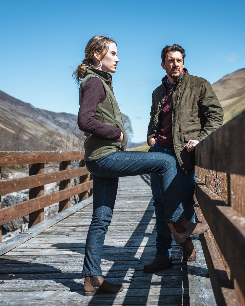 Lovat Coloured Hoggs of Fife Stenton Ladies Fleece Gilet on bridge background 