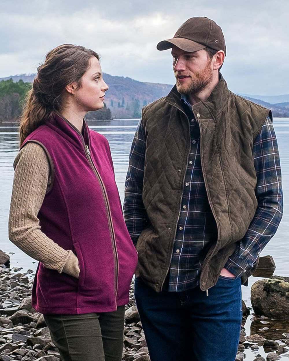 Merlot Coloured Hoggs of Fife Stenton Ladies Fleece Gilet on coastal background 