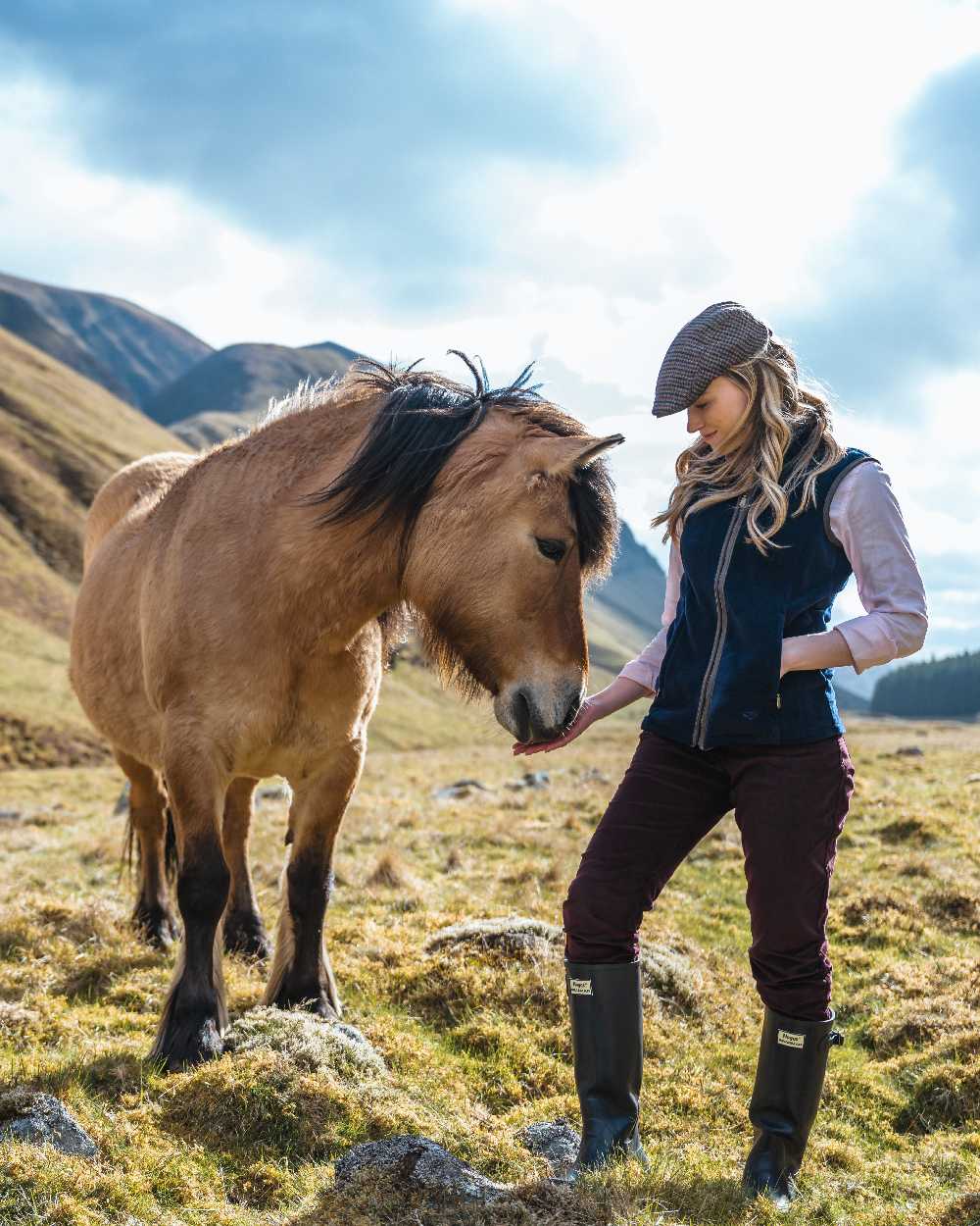 Midnight Navy Coloured Hoggs of Fife Stenton Ladies Fleece Gilet on mountain background 