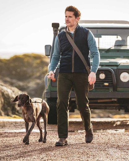 Midnight Navy coloured Hoggs of Fife Stenton Technical Fleece Gilet on car background 