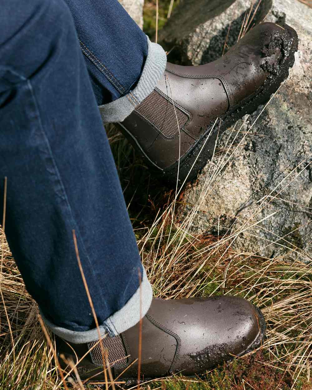 Dark Brown coloured Hoggs of Fife Classic Safety Dealer Boot on hay background 