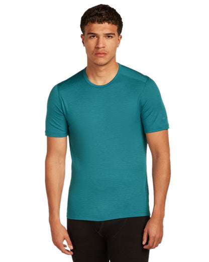 Topaz Coloured Icebreaker Mens Merino 200 Oasis Crew Short Sleeve Thermal Top on white background 