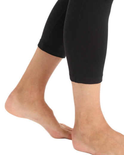 Black coloured Icebreaker Mens Merino 200 Oasis Mid Calf Thermal Leggings on white background 