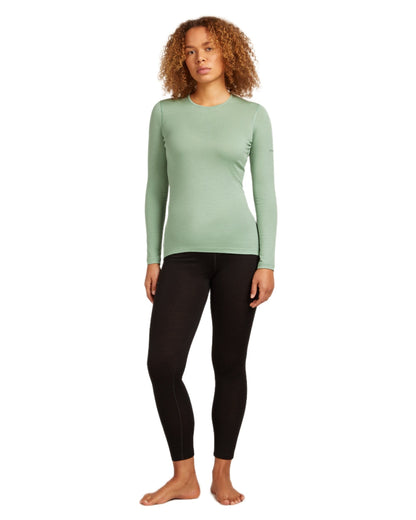 Sea Glass Coloured Icebreaker Womens Merino 200 Oasis Crewe Thermal Top on white background 
