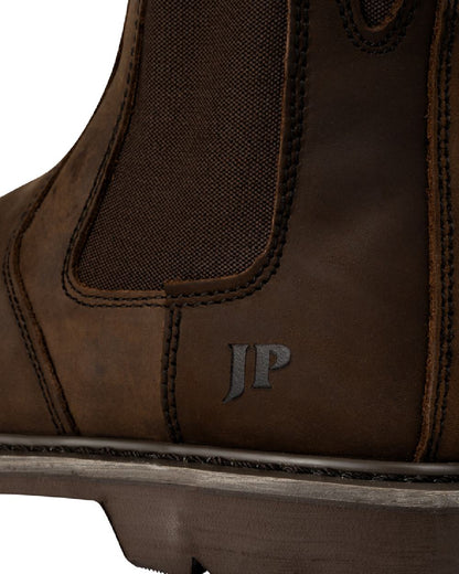 Brown coloured Jack Pyke Mens Safety Dealer Boots on white background 