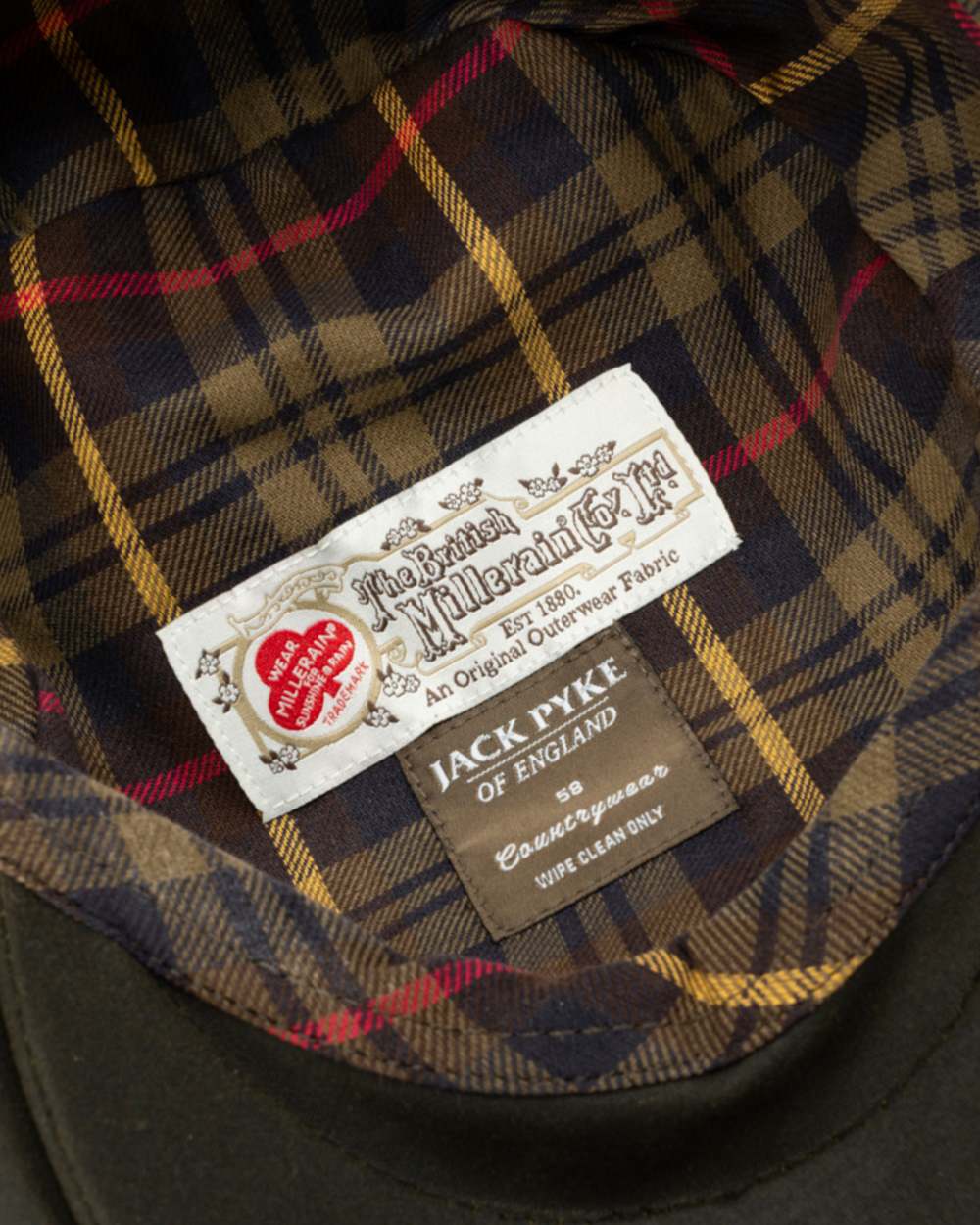 Green coloured Jack Pyke Wax Flat Cap on white background 