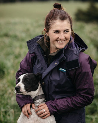 Navy coloured Kaiwaka Womens Lady of the Land AgTex Parka on grassy background 