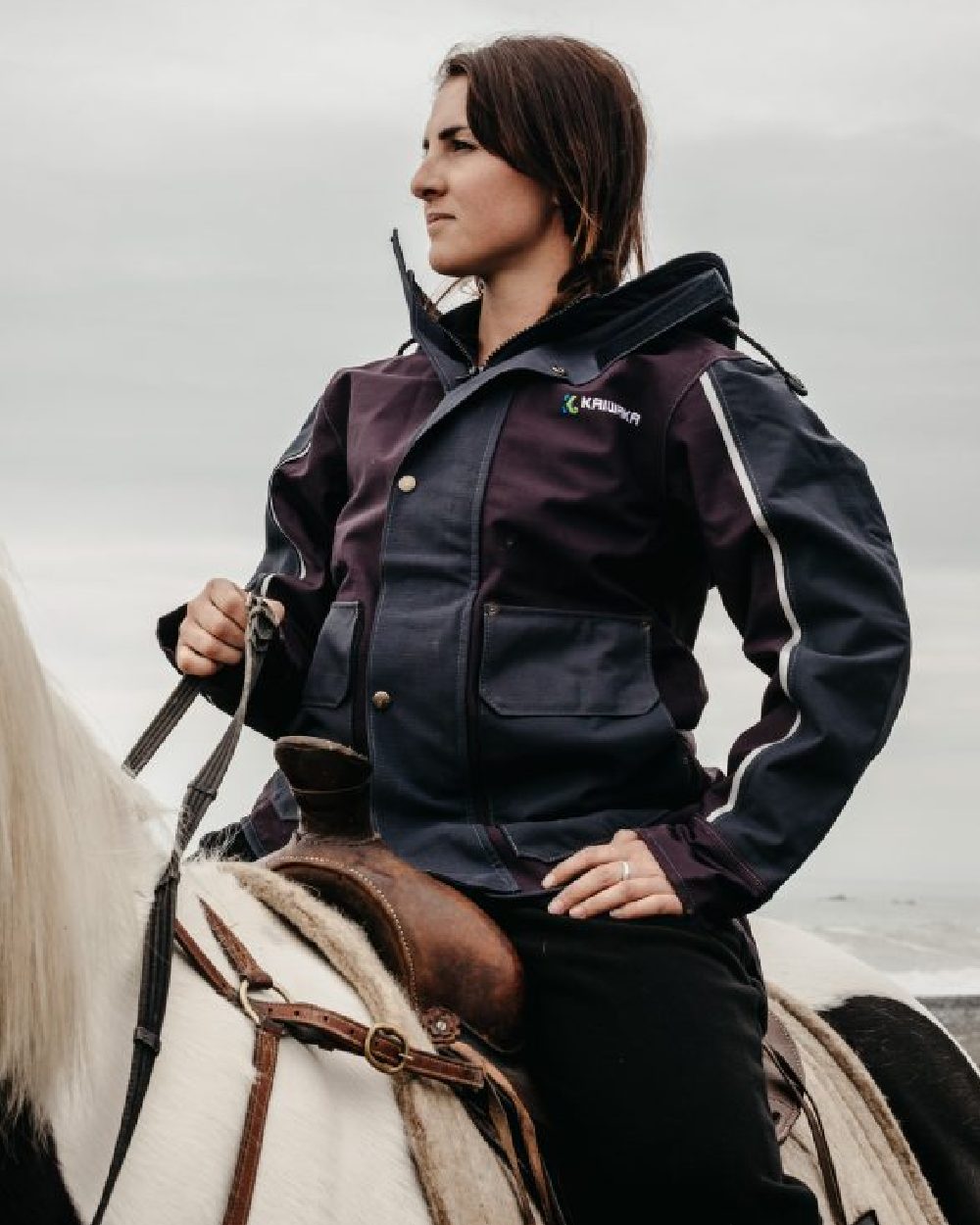 Navy coloured Kaiwaka Womens Stormforce Parka on sky background 