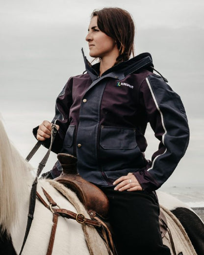 Navy coloured Kaiwaka Womens Stormforce Parka on sky background 