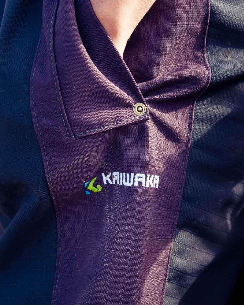 Navy coloured Kaiwaka Womens Stormforce Overtrouser on blurry background 