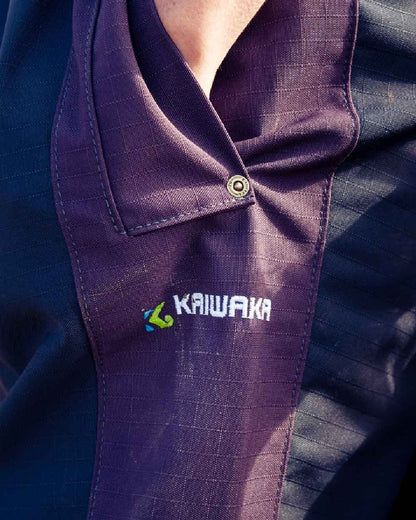 Navy coloured Kaiwaka Womens Stormforce Overtrouser on blurry background 