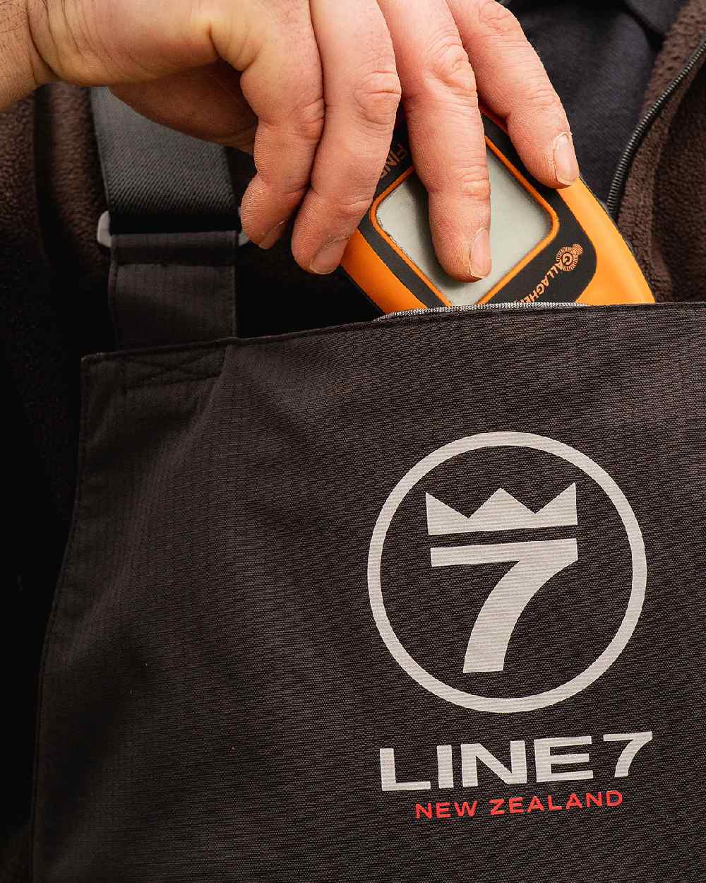 Black Coloured Line 7 Mens Storm Pro 20 Bib Pant V2 on white background 