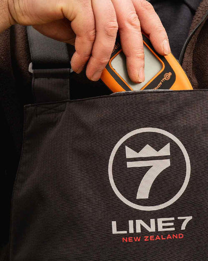 Black Coloured Line 7 Mens Storm Pro 20 Bib Pant V2 on white background 