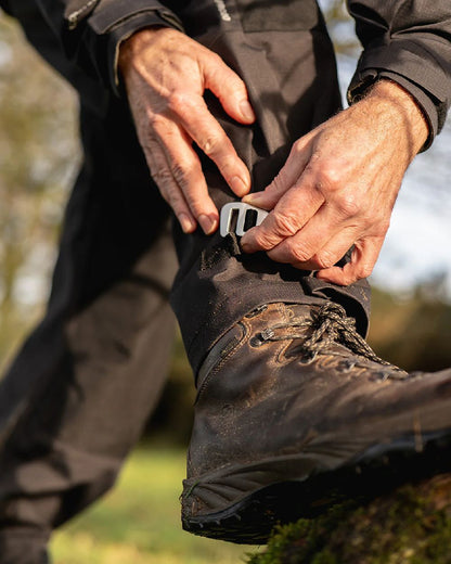 Black Coloured Line 7 Mens Storm Pro 20 Bib Pant V2 on blurry background 