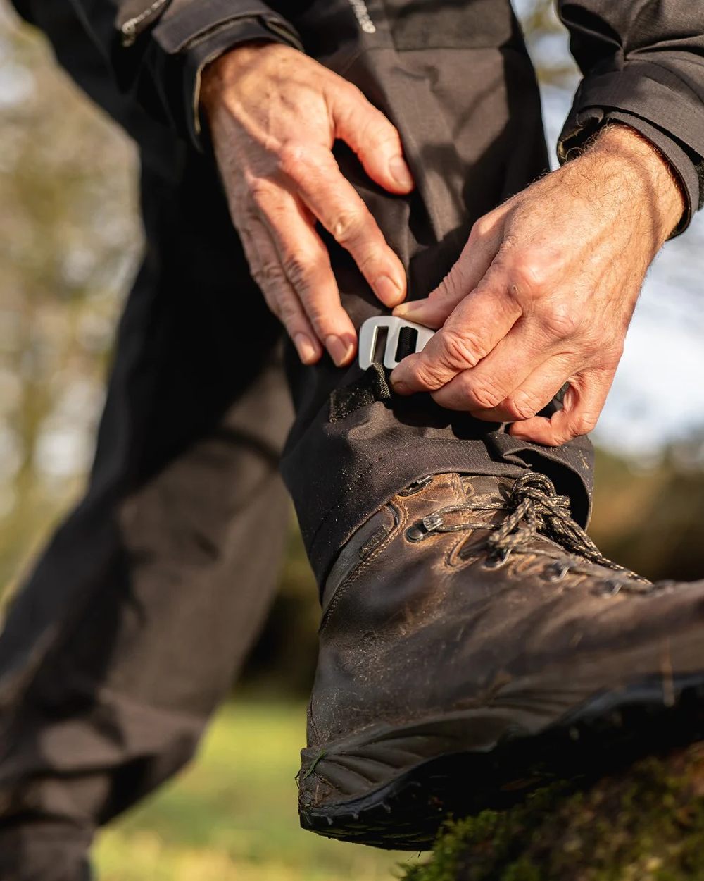 Black Coloured Line 7 Mens Territory Storm Pro20 Waterproof Bib Overtrouser on blurry background 