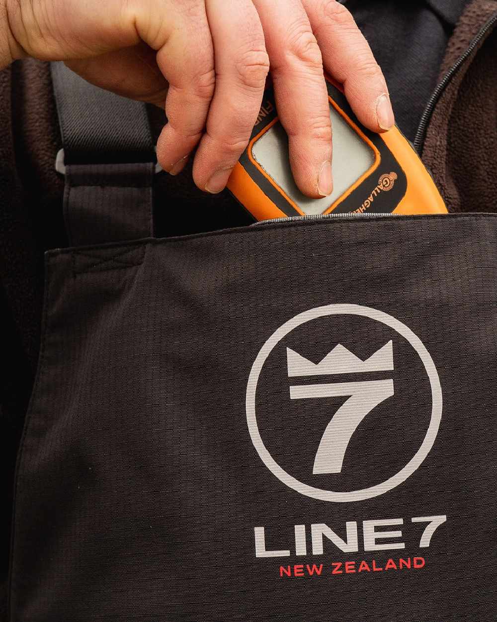 Black Coloured Line 7 Mens Territory Storm Pro20 Waterproof Bib Overtrouser on white background 