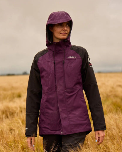 Blackberry Black Colour Line 7 Womens Territory Storm Pro20 Waterproof Jacket on farm background 