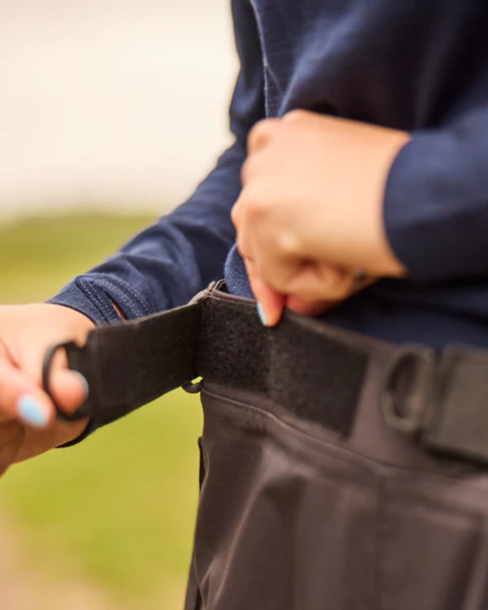 Black coloured Line 7 Womens Territory Storm Pro20 Waterproof Overtrouser on blurry background 