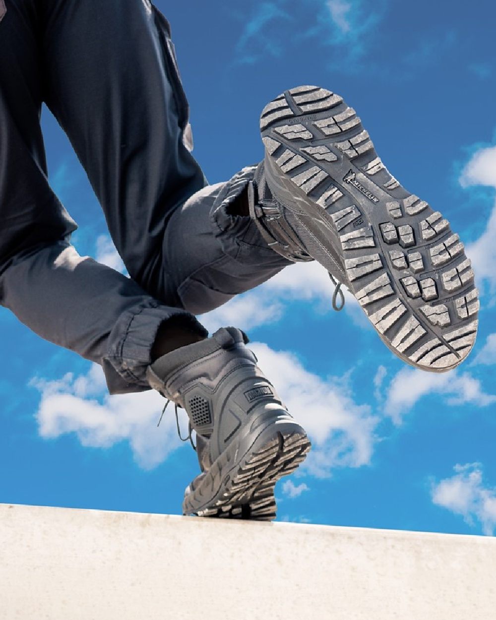 Black Coloured Magnum Mens Spider Exo 6.0 CT Waterproof Safety Boots on outdoor background 