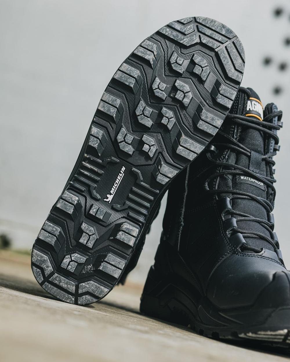 Black Coloured Magnum Mens Storm Force 8.0 Waterproof Safety Boots on  outdoor background 