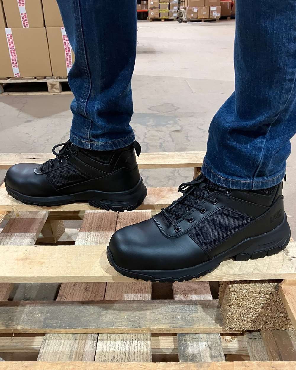 Black Coloured Magnum Mens Vanguard 6.0 CT CP Safety Boots on outdoor background 