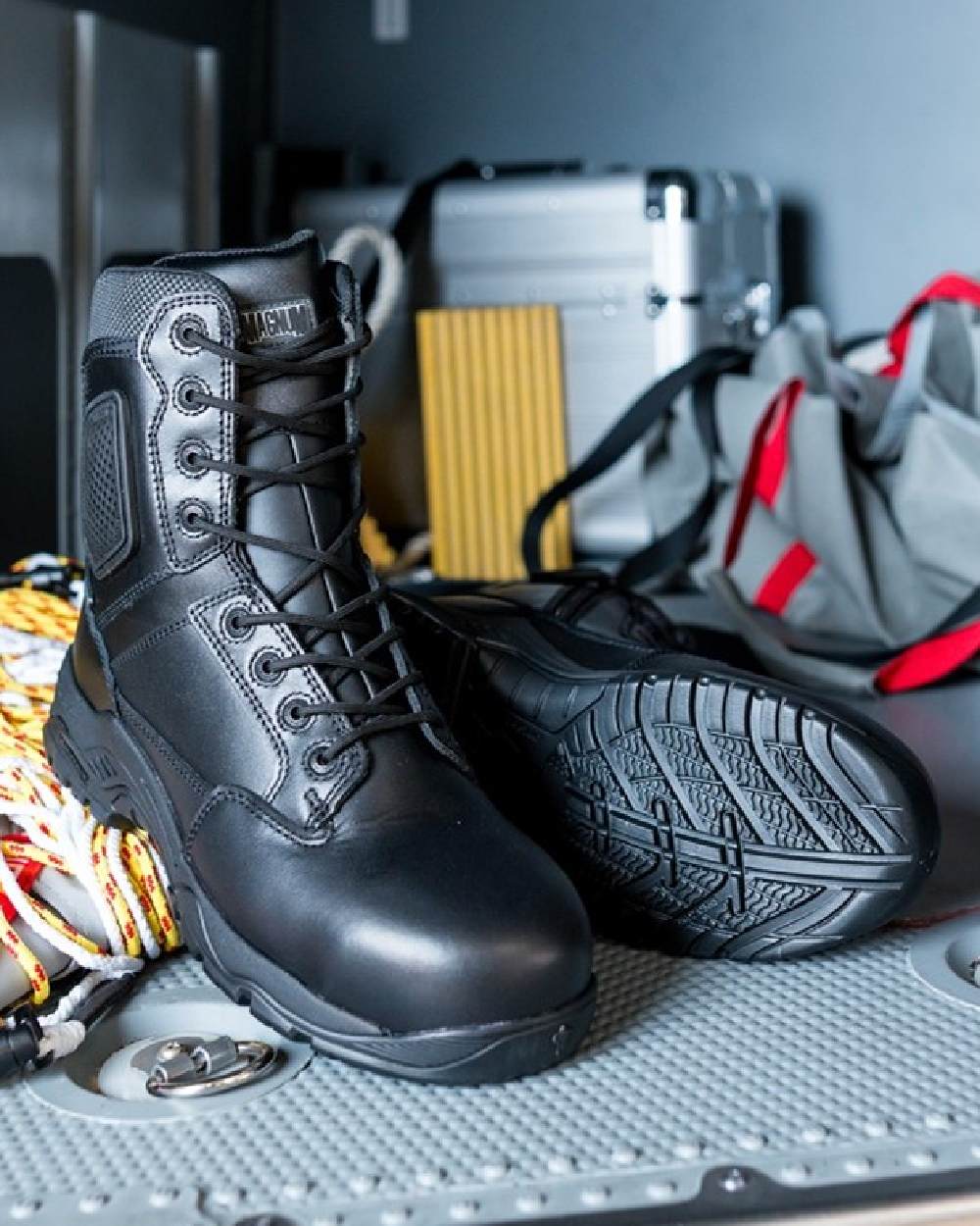 Black Coloured Magnum Strike Force 8.0 Side-Zip CT CP Waterproof Uniform Safety Boots on outdoor background 