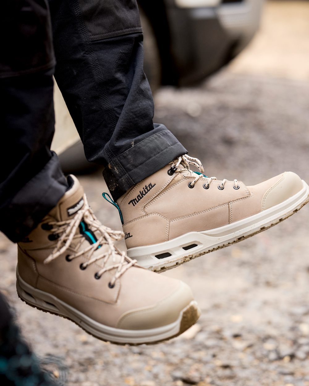 Stone Coloured Makita Mens Anjo Safety Boots on outdoor background 